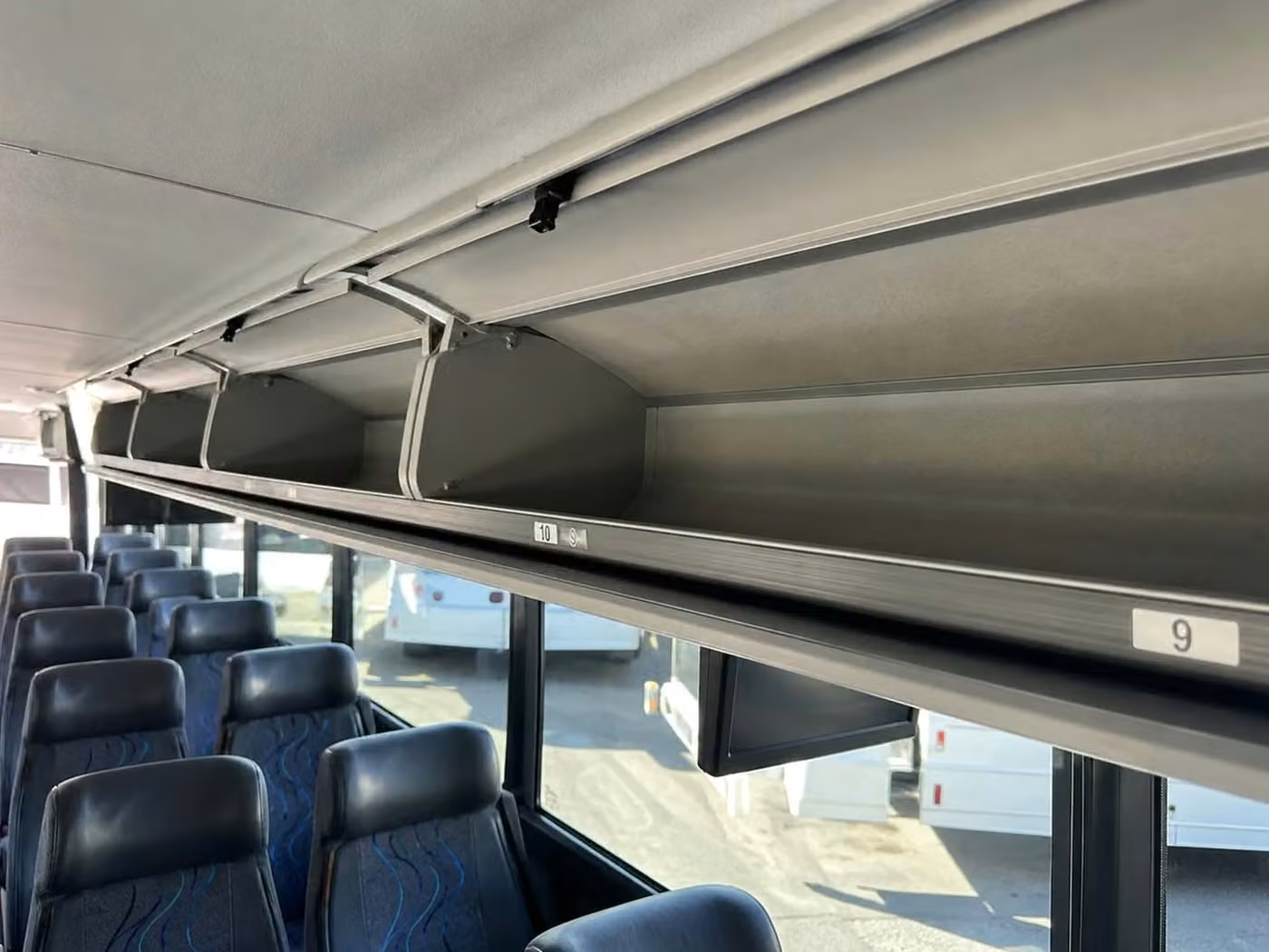 fort wayne 25 passenger minibus overhead storage